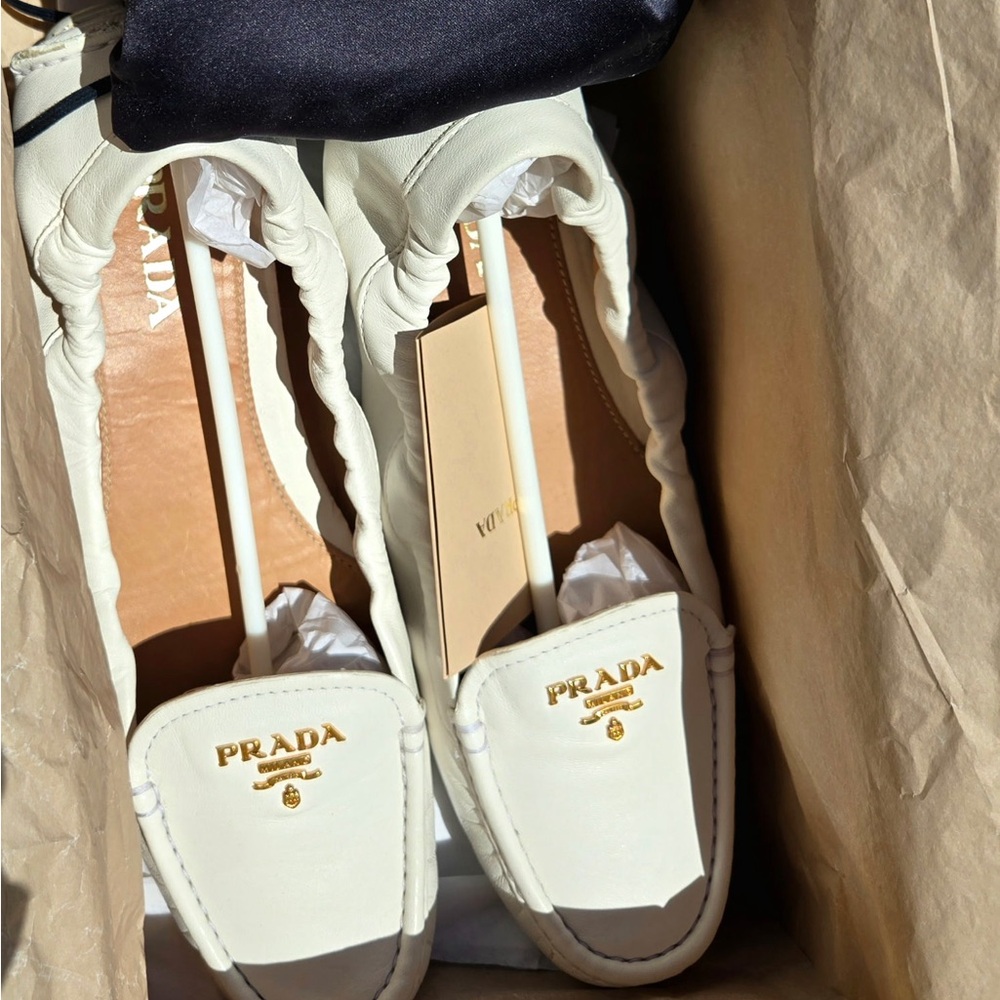 Prada Cream Leather Moccasin Loafers with Gold Logo